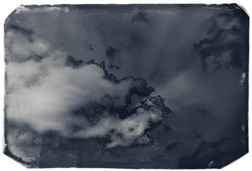 Vintage sky background with dark border and retro texture.