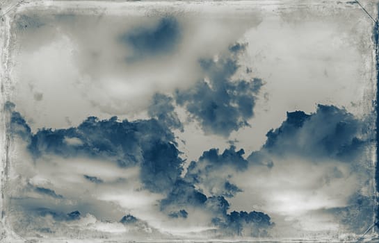 Vintage sky background with dark border and retro texture.