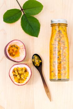 Fresh passion fruit and juice in the bottle for healthy and refresh.