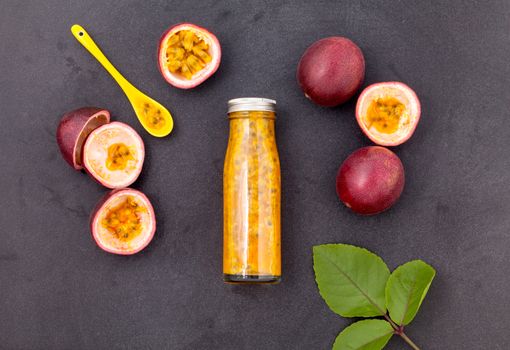 Fresh passion fruit and juice in the bottle for healthy and refresh.