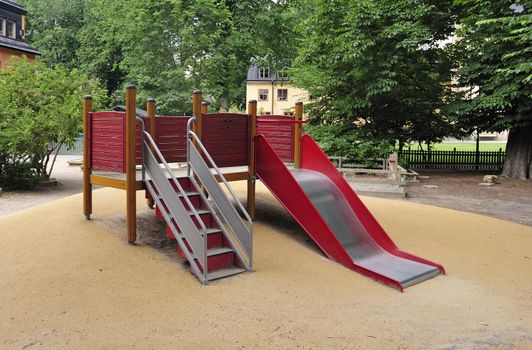 A colorful playground in a park.