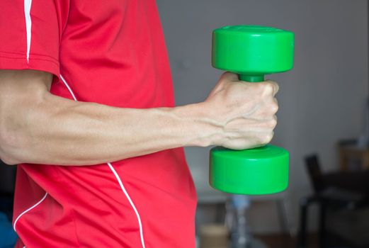 Fitness Man Lifting Weights - Green Dumbell