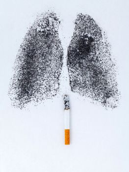 Shape of lungs with charcoal powder and cigarette on white background