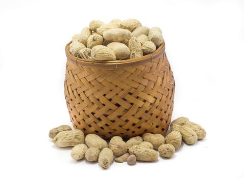 Peanuts in the basket isolated with white background 