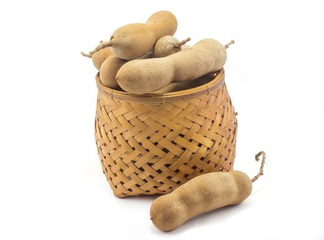 Tamarind in the basket isolated with white background 