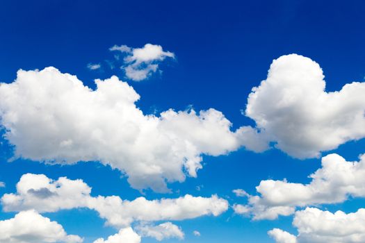 Sunny blue sky with white clouds