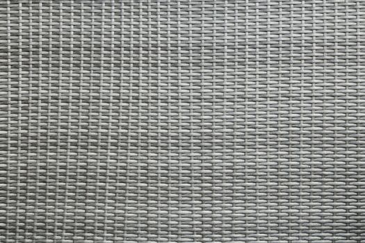Grey woven webbing background with pattern texture and structure