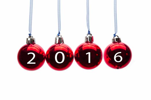 Hanging red christmas balls with numbers of year 2016 isolated on white background