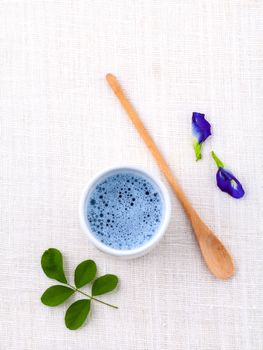 pigeon wing pea healthy drinking water on white table.