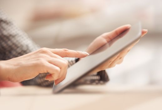 Businesswoman at office working with digital tablet