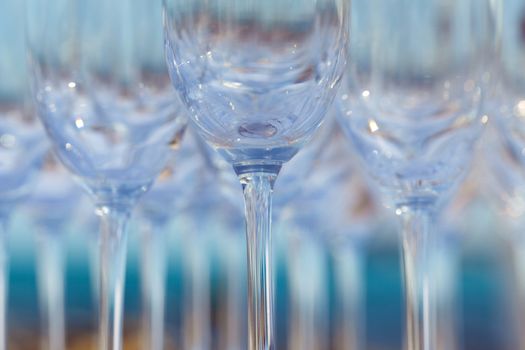 Empty wine glasses setting for wedding party.