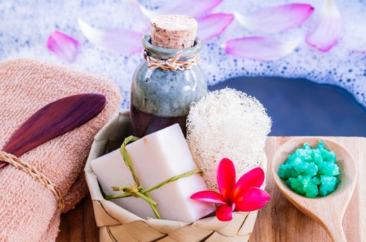 Spa and wellness treatment setup on wooden panel.