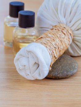 Natural Spa Ingredients . The herbal compress ball and massage oil for spa treatment.
