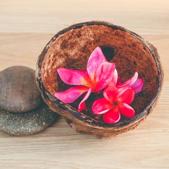 Spa stones with frangipani flower. - Concept for spa and meditation.
