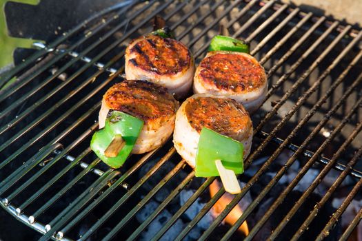 Grilled meat on a summer barbecue in the garden