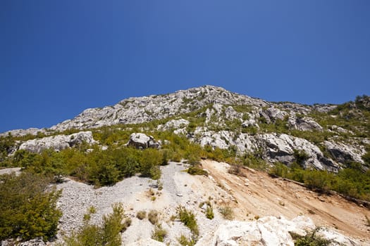  the tops of the mountains  photographed by a close up. which are in Montenegro