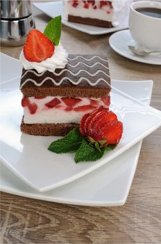 Strawberry souffle on a chocolate sponge cake 