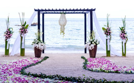 Wedding setting venue on the beach .
