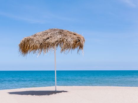 The beautiful straw umbrella at the beach. - at Koh Samui Thailand