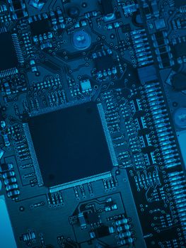 Abstract blue motherboard background with electronic chip