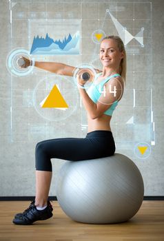 fitness, sport, training, future technology and lifestyle concept - smiling woman with dumbbells and exercise ball in gym and graph projection