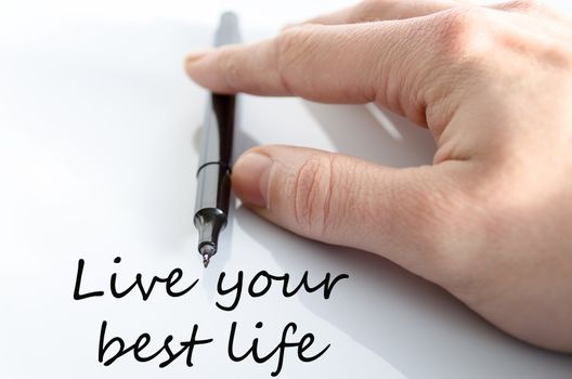 Pen in the hand isolated over white background and text concept