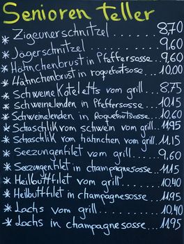 Menu written with chalk on a blackboard