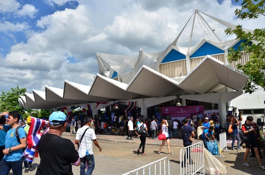 Bangkok, Thailand - July 3, 2015: Thai supporters at Indoor Stadium Huamark during the FIVB Volleyball World Grand Prix Thailand and Serbia on July 3, 2015 in Bangkok, Thailand.