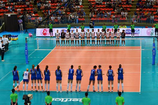 Bangkok, Thailand - July 3, 2015: Thailand and Serbia Volleyball Women Team in action during The FIVB Volleyball World Grand Prix at Indoor Stadium Huamark on July 3, 2015 in Bangkok, Thailand.