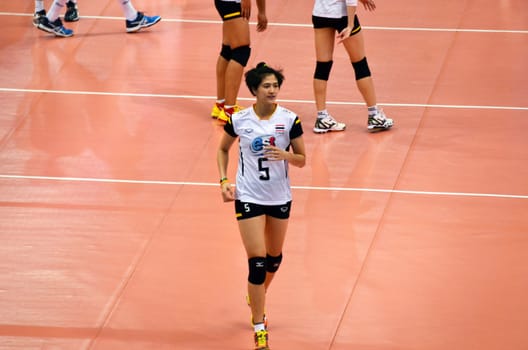 Bangkok, Thailand - July 3, 2015: Pleumjit Thinkaow #5 of Thailand during the FIVB Volleyball World Grand Prix Thailand and Serbia at Indoor Stadium Huamark on July 3, 2015 in Bangkok, Thailand.