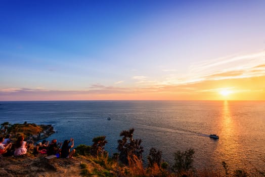 Colorful landscape beautiful sunset over the island and sea at Laem Phromthep Cape scenic point is a famous attractions of Phuket Province in Thailand