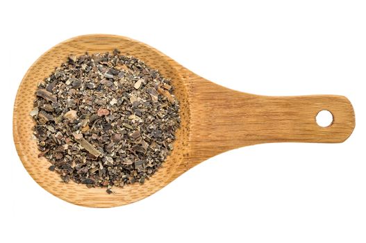 bladderwrack  seaweed flakes - top view of a wooden spoon isolated on white