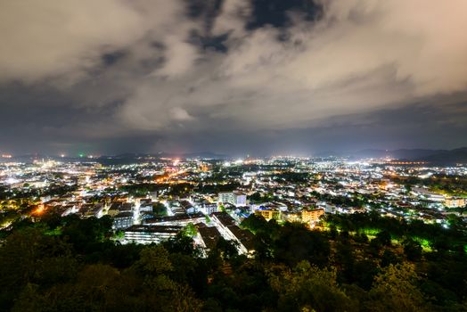 High angle view city at night sky from Khao Rang viewpoint is a tourist town near the sea on big island of Phuket province in Thailand
