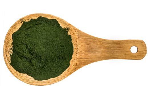 Nutrient-rich organic spirulina powder on a wooden spoon, isolated on white, top view