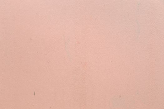 A grained pinkish concrete wall with texture, some spots but they are there in real life and create some life to this one