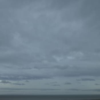 Dark cloudy sky over the ocean
