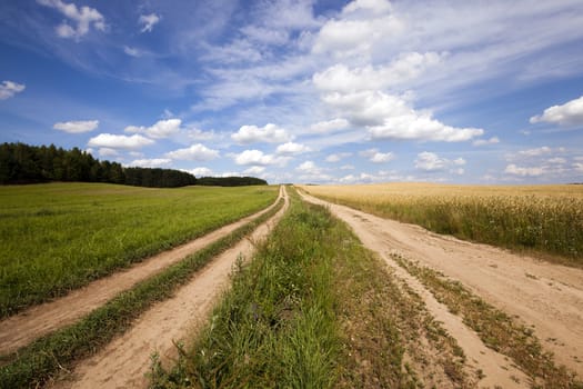   the small not asphalted road in rural areas