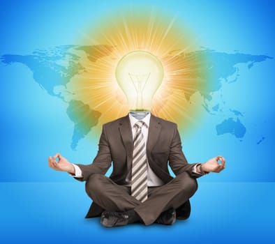 Businessman sitting in lotus posture with bulb instead head on abstract blue background with world map