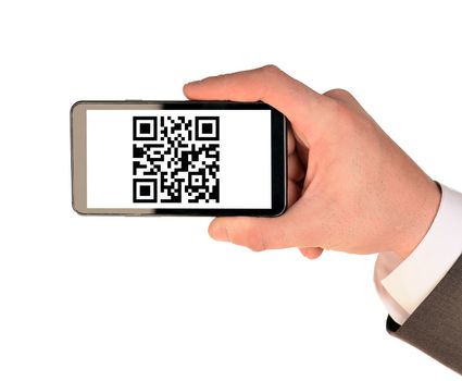 Businessmans hand holding smartphone with QR-code on isolated white background