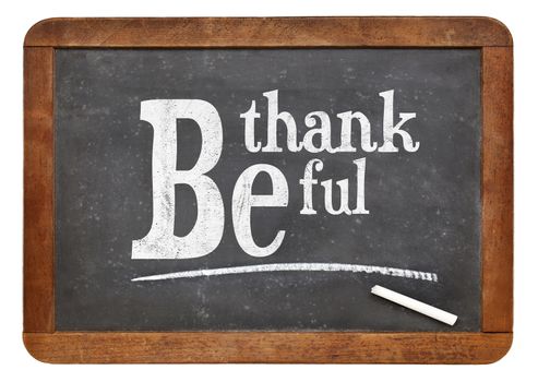 Be thankful blackboard sign - white chalk text  on a vintage slate blackboard