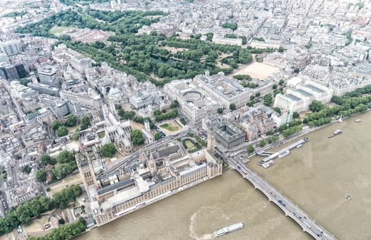 London. Helicopter view of Westminster Palace and Bridge on a beautiful summer day.