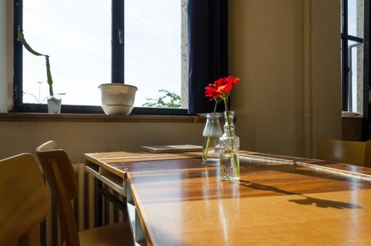 Flowers decorated on the table in restaurant.