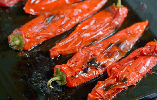 roasted red peppers on steel tray