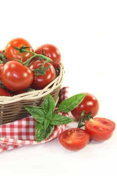 fresh tomatoes in a woven basket