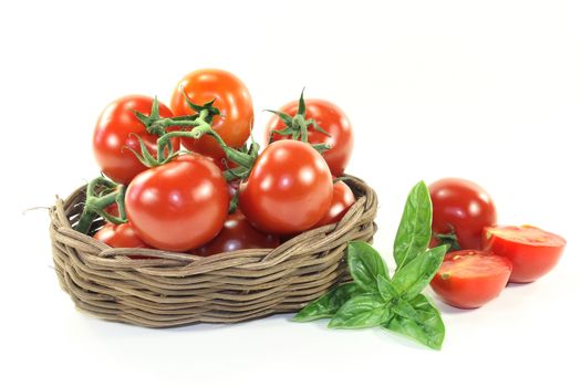 fresh tomatoes in a woven basket