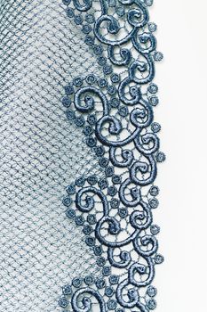 Decorative lace on insolated white background - macro photo