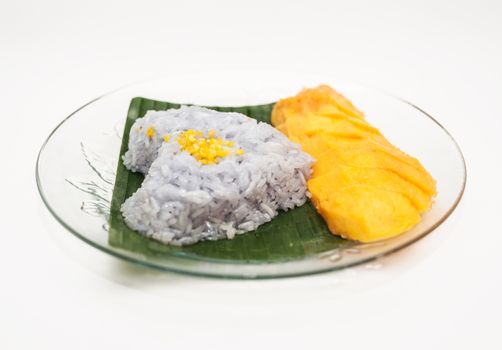 Mango sticky rice, sweet dessert with coconut milk on white background