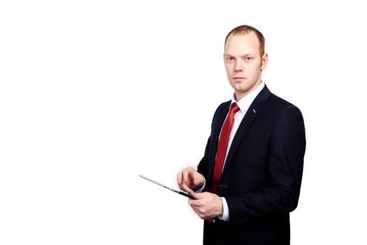 Successful manager of the company is working on a tablet computer on an isolated white background.