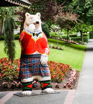 A giant stuffed bear in a kilt greets hotel clients in Victoria, B.C.