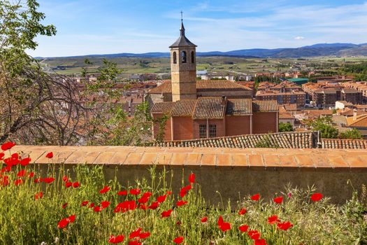 Convent Santa Maria, Convento de Santa Maria de Gracia Red Poppies Swallows Avila Ancient Medieval City Castile Spain.  Convent was founded in the 1500s by Lady Maria Mencia de San Agustin Avila is described as the most 16th century town in Spain. 